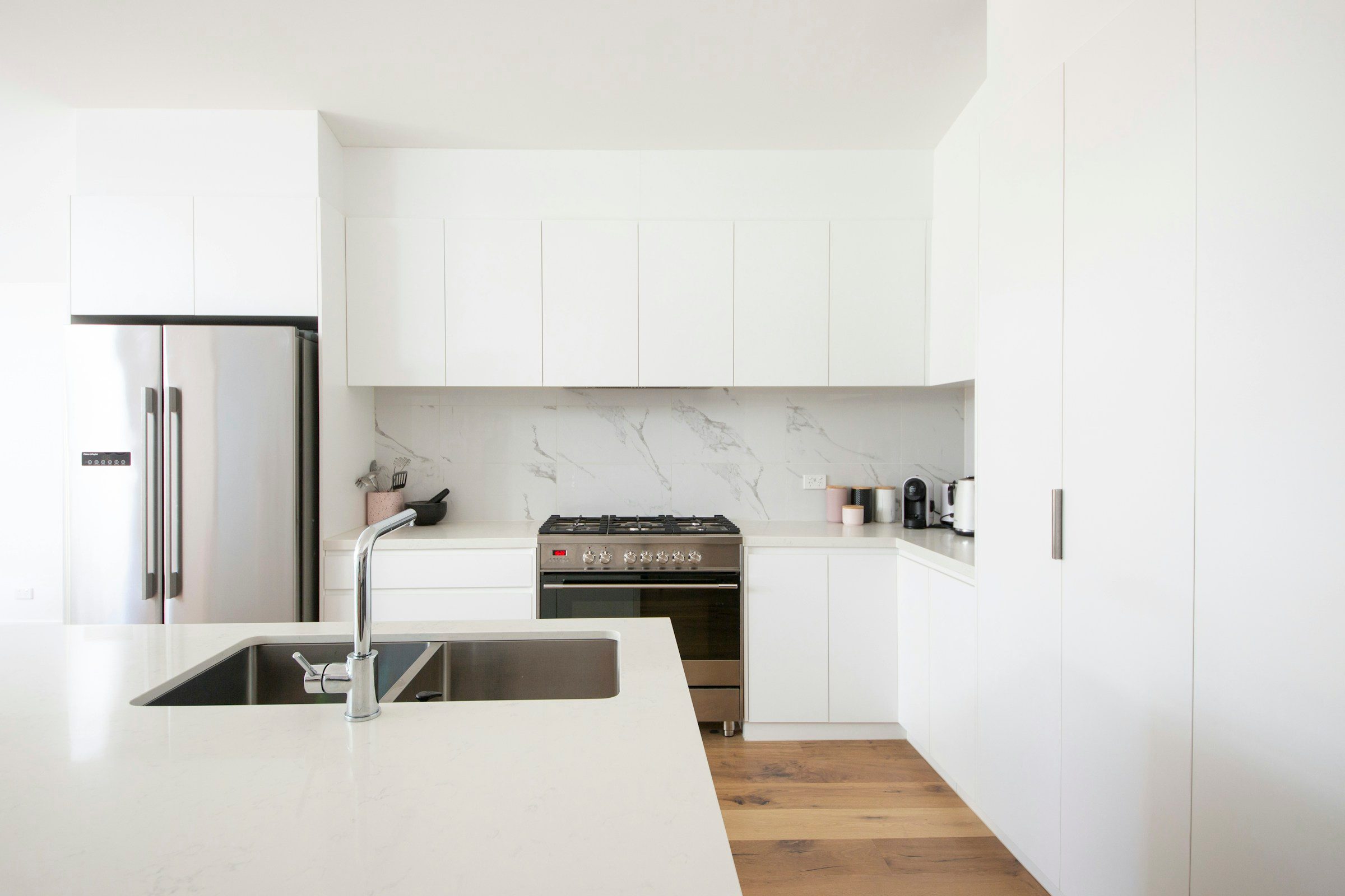 White painted kitchen with appliances, example image